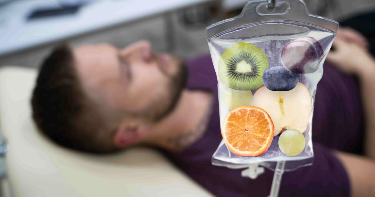 Patient receiving Intravenous (IV) Nutritional Therapy in Sandy, UT with a nutrient-rich infusion featuring fruits for hydration and wellness.