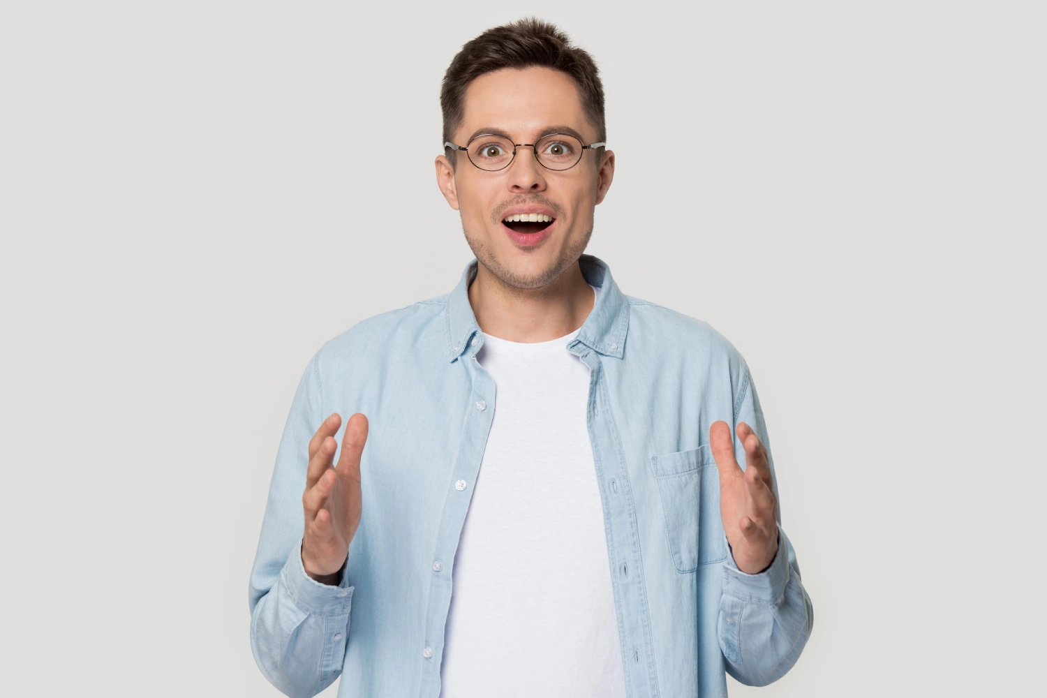 Excited man representing confidence after enhancement treatment